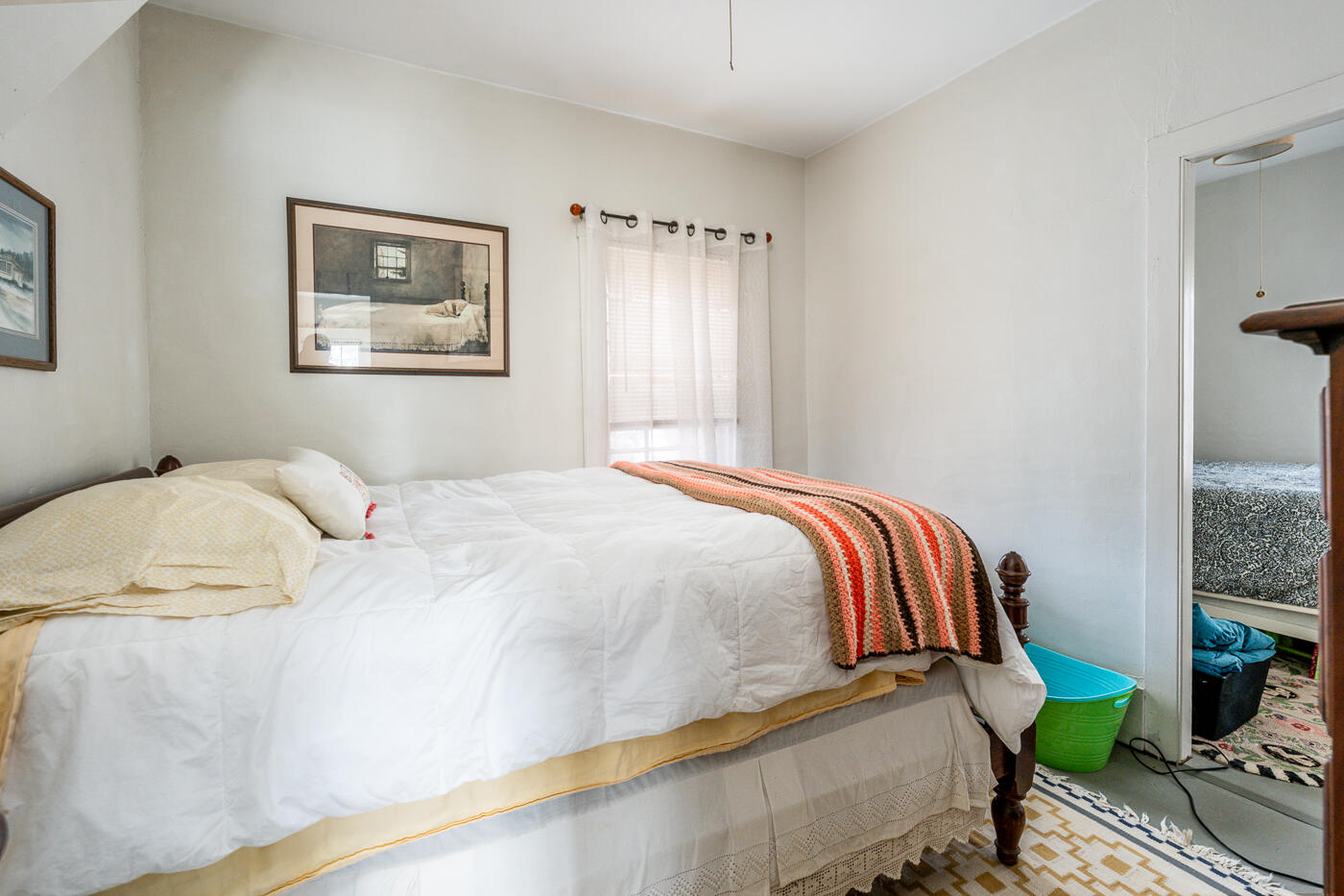 105 West Main Street Wellfleet, MA 02667 - Photo 27 of 59 a bedroom with a bed and painting on the wall