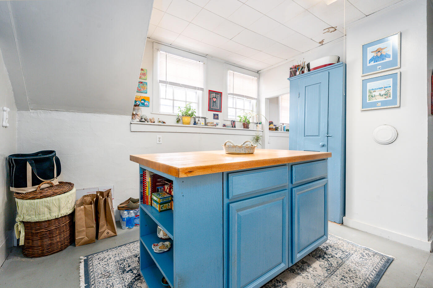 105 West Main Street Wellfleet, MA 02667 - Photo 32 of 59 a kitchen with sink and refrigerator