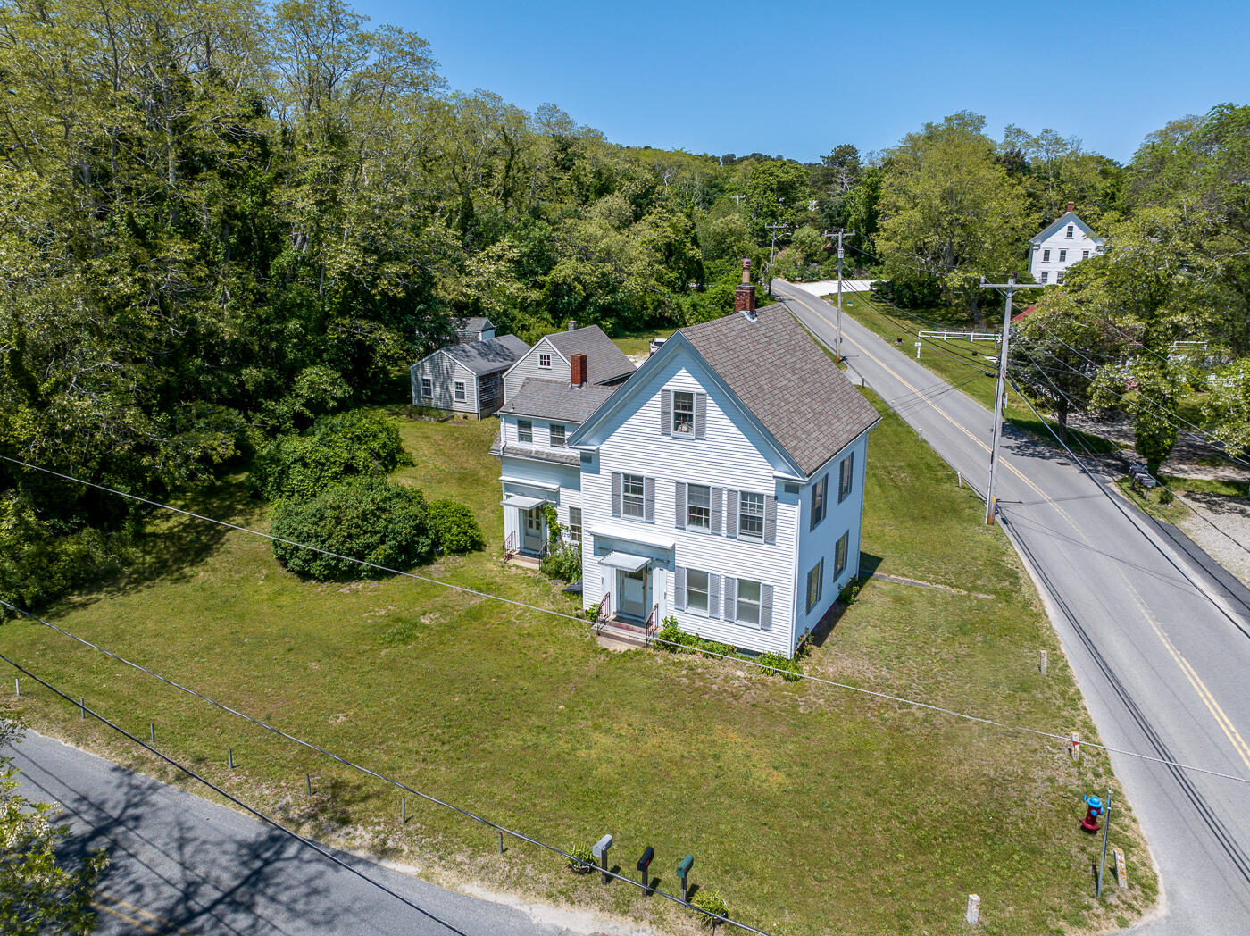 105 West Main Street Wellfleet, MA 02667 - Photo 59 of 59 a aerial view of a house with a yard