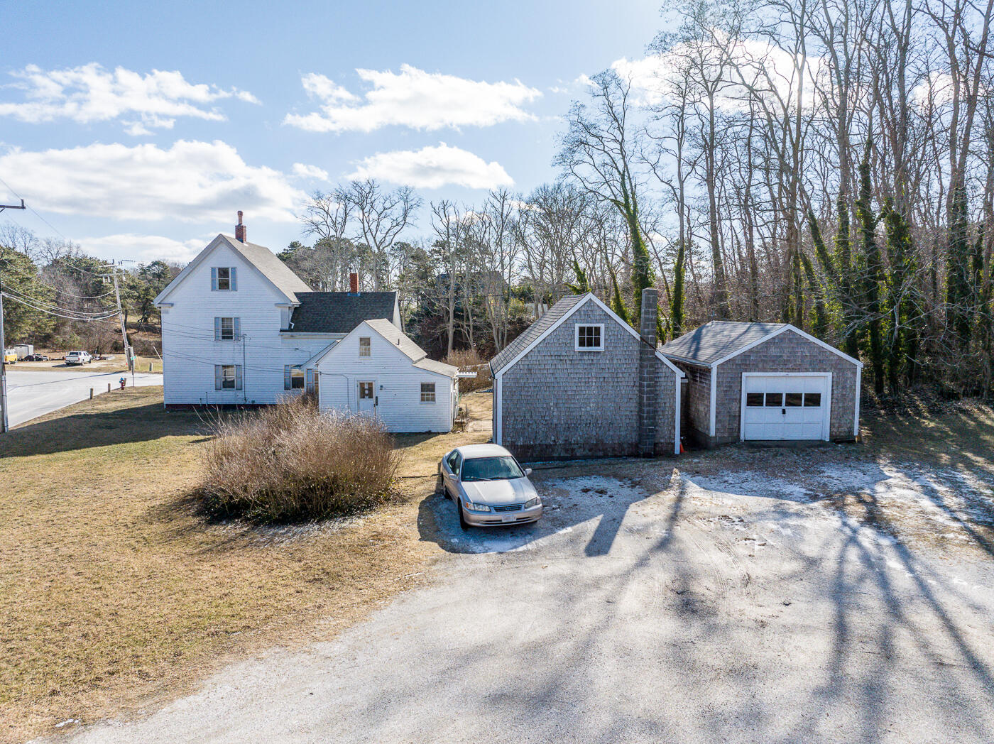 105 West Main Street Wellfleet, MA 02667 - Photo 9 of 59 a house view with a garden space