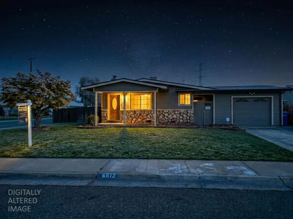 a front view of a house having yard