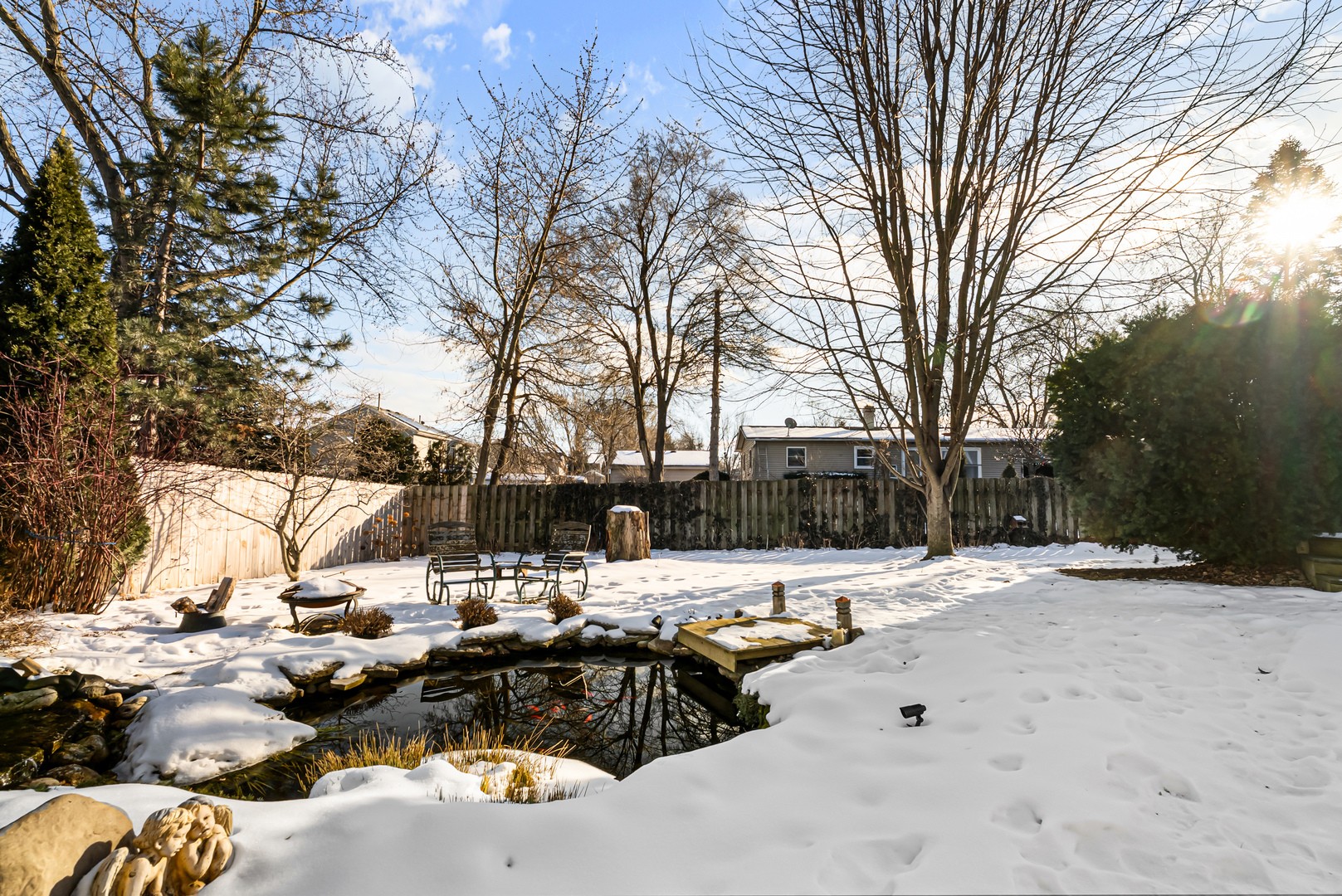 325 Hillandale Street Round Lake, IL 60073 - Photo 26 of 31 a view of outdoor space with patio chairs and a fire pit
