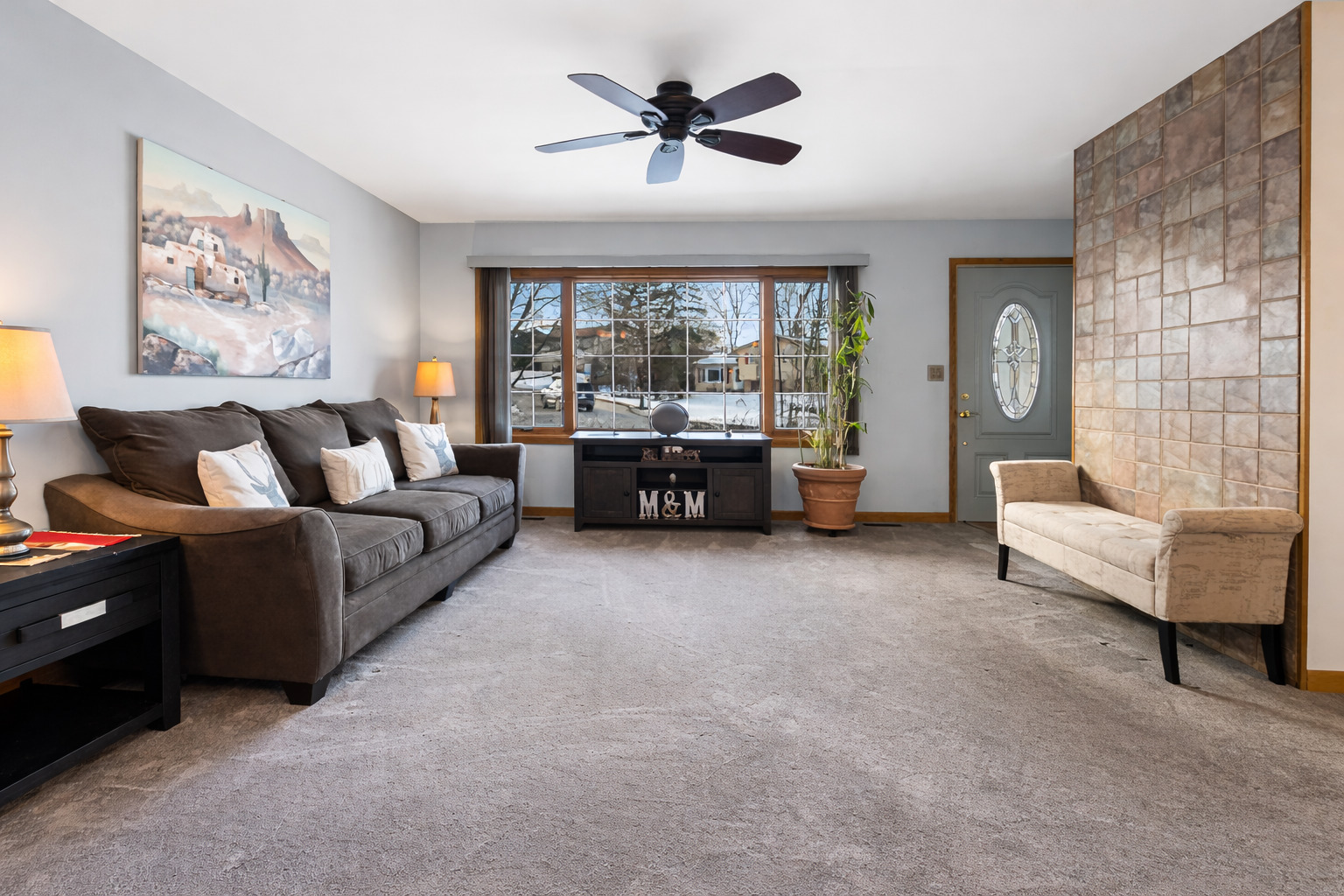 325 Hillandale Street Round Lake, IL 60073 - Photo 6 of 31 a living room with furniture and a large window