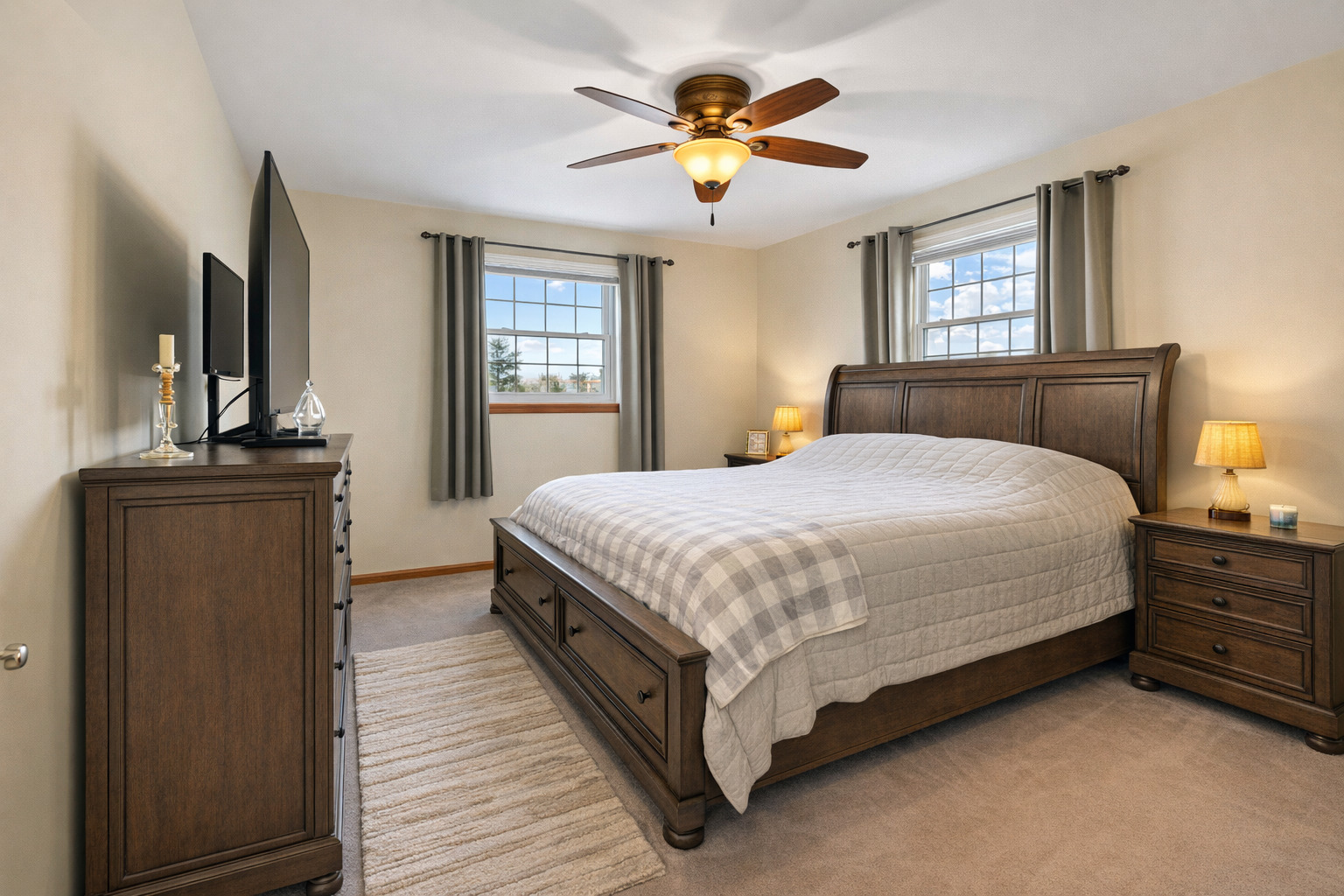 325 Hillandale Street Round Lake, IL 60073 - Photo 9 of 31 a bedroom with a bed dresser and a window