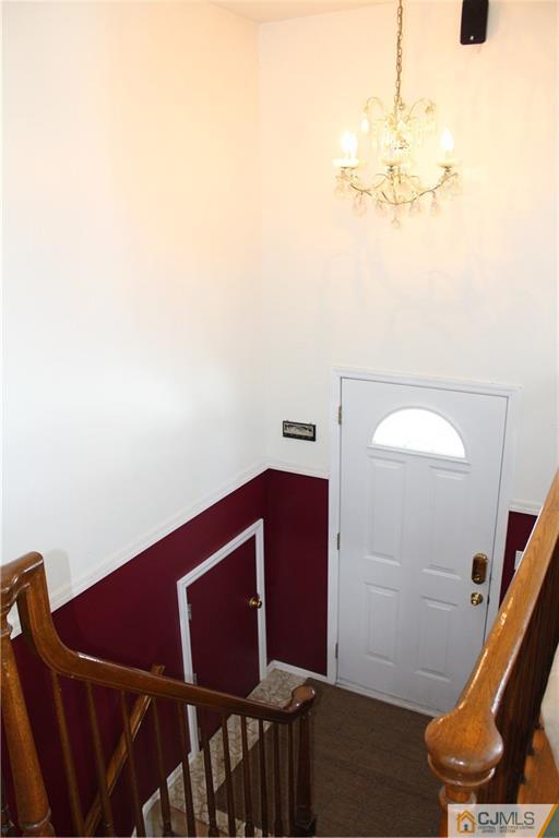 23 Hilltop Road Edison, NJ 08820 - Photo 2 of 17 a view of a room with wooden floor