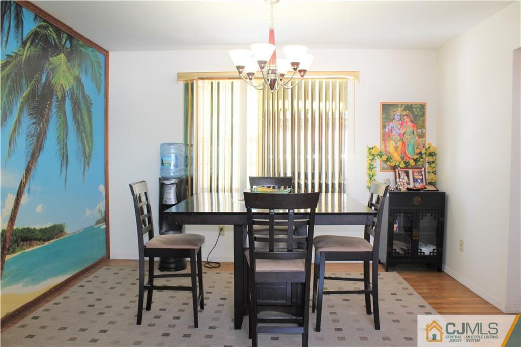 23 Hilltop Road Edison, NJ 08820 - Photo 5 of 17 a dining room with furniture and window