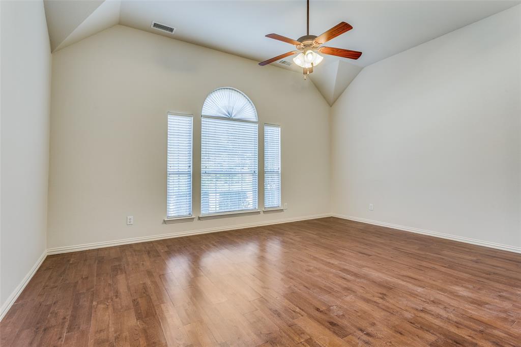 1104 Carson Drive Allen, TX 75002 - Photo 18 of 36 wooden floor in an empty room with a window