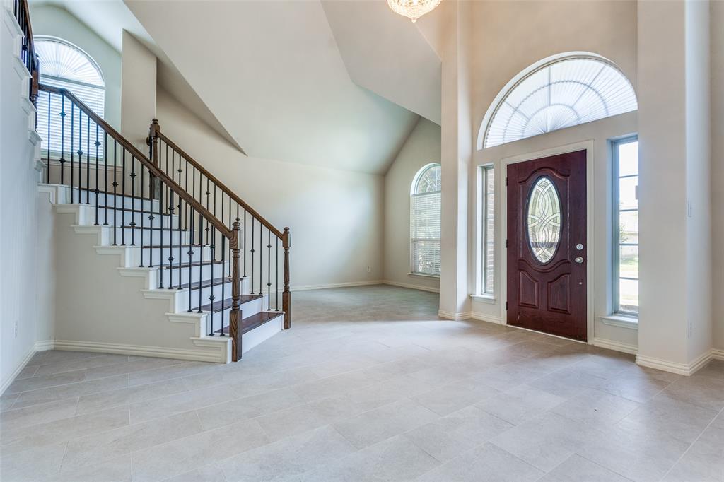 1104 Carson Drive Allen, TX 75002 - Photo 2 of 36 a view of an entryway door with a livingroom
