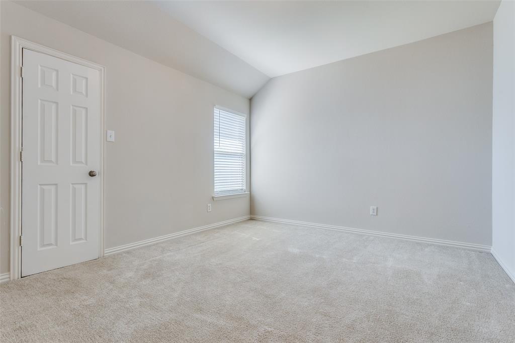 1104 Carson Drive Allen, TX 75002 - Photo 31 of 36 an empty room with windows and closet