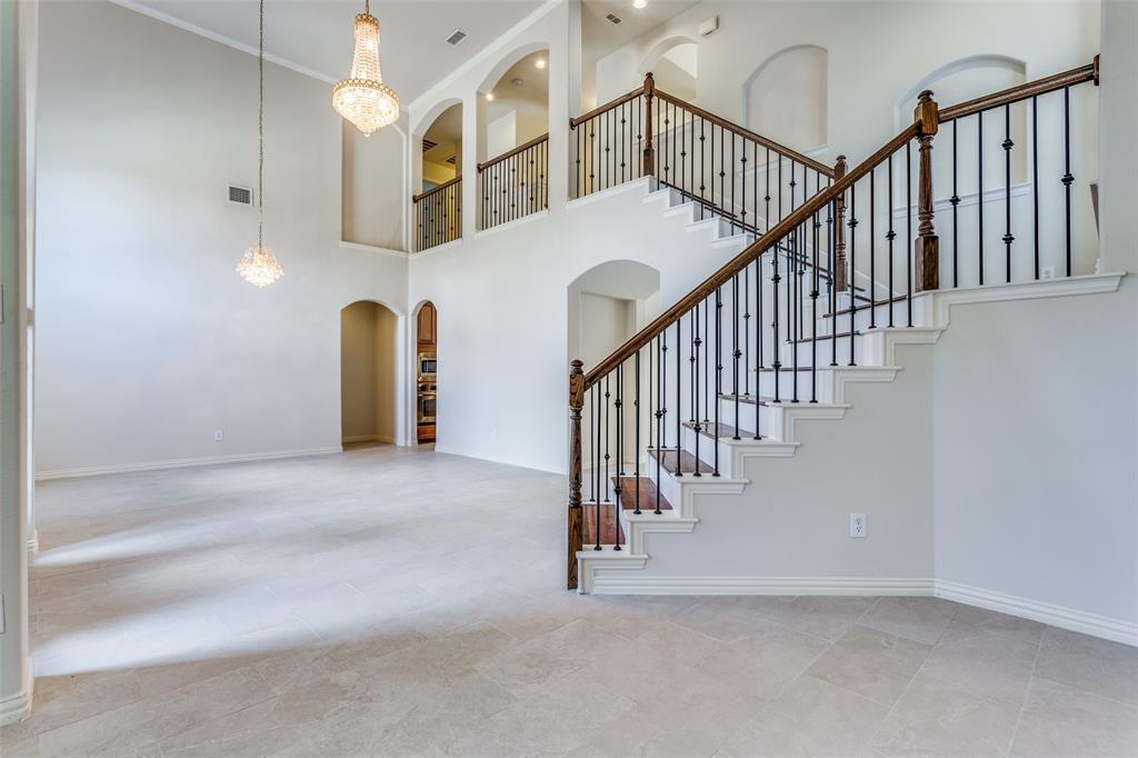 1104 Carson Drive Allen, TX 75002 - Photo 4 of 36 a view of staircase with white walls and a window
