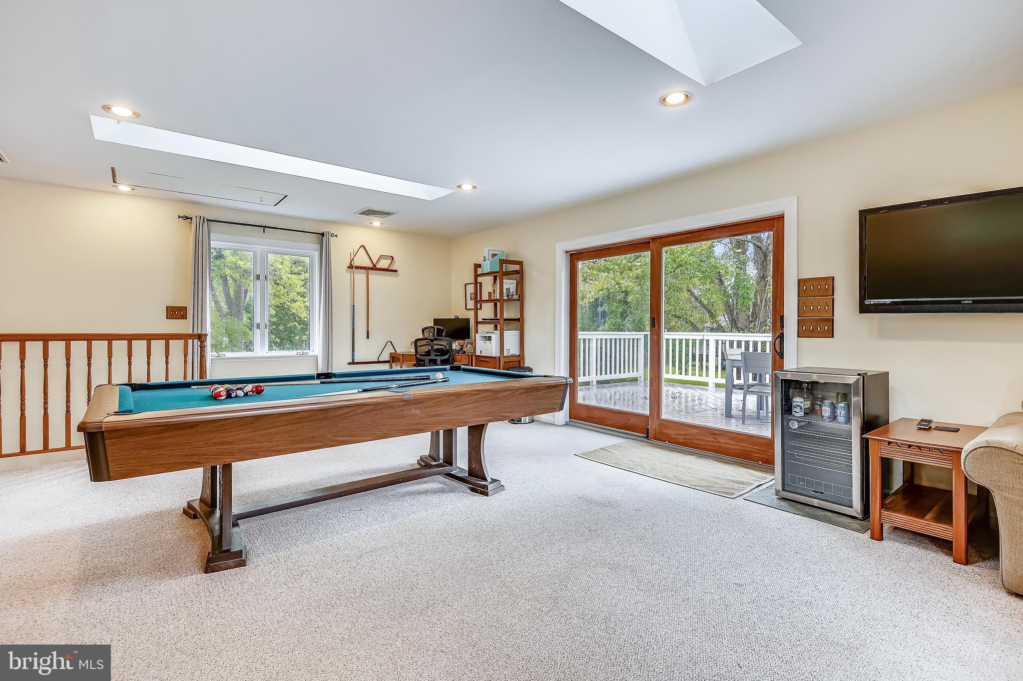 615 Burley Road Annapolis, MD 21409 - Photo 13 of 42 Loft has updated sliders to large deck