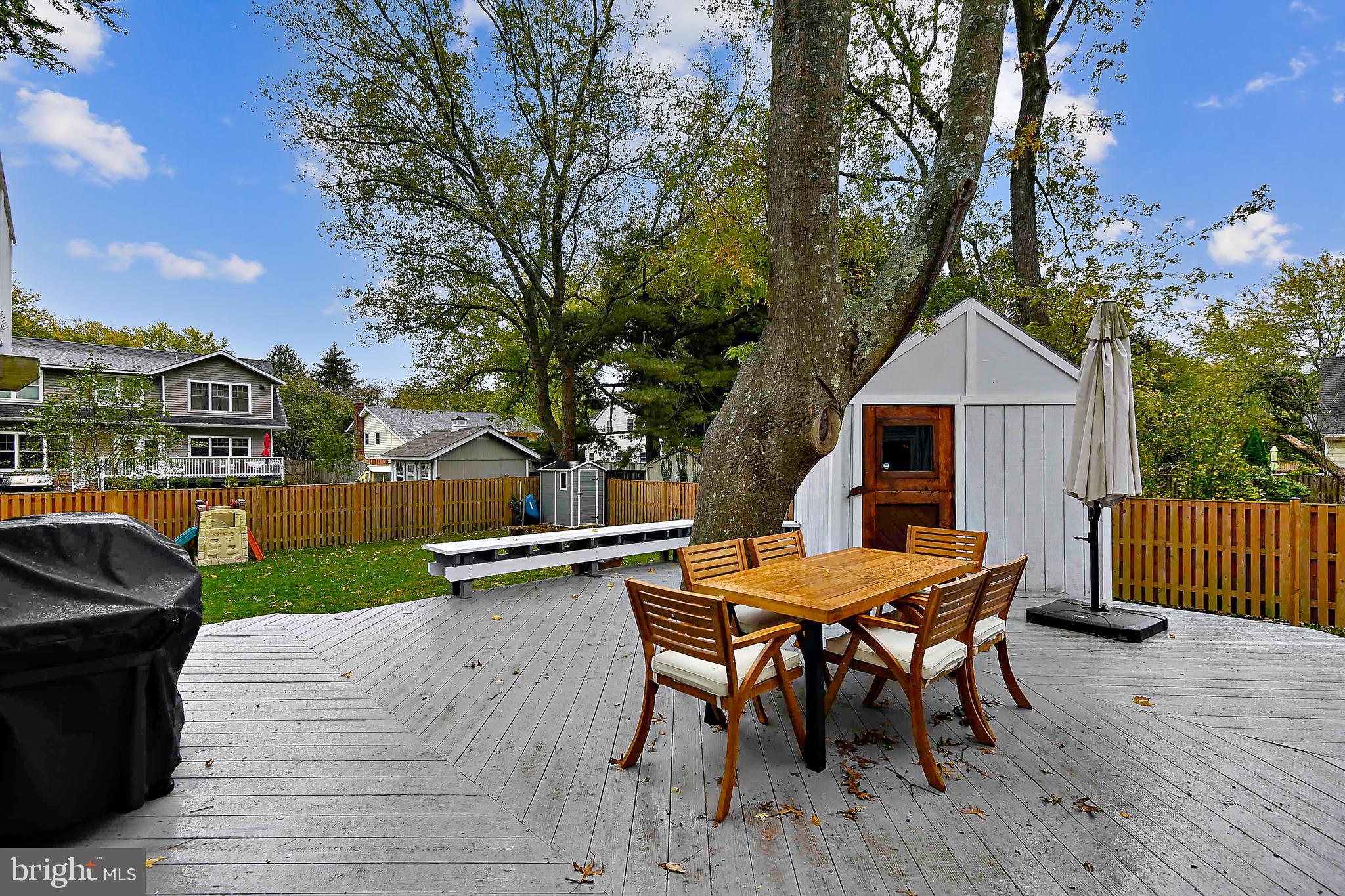 615 Burley Road Annapolis, MD 21409 - Photo 33 of 42 Lower deck area with custom shed