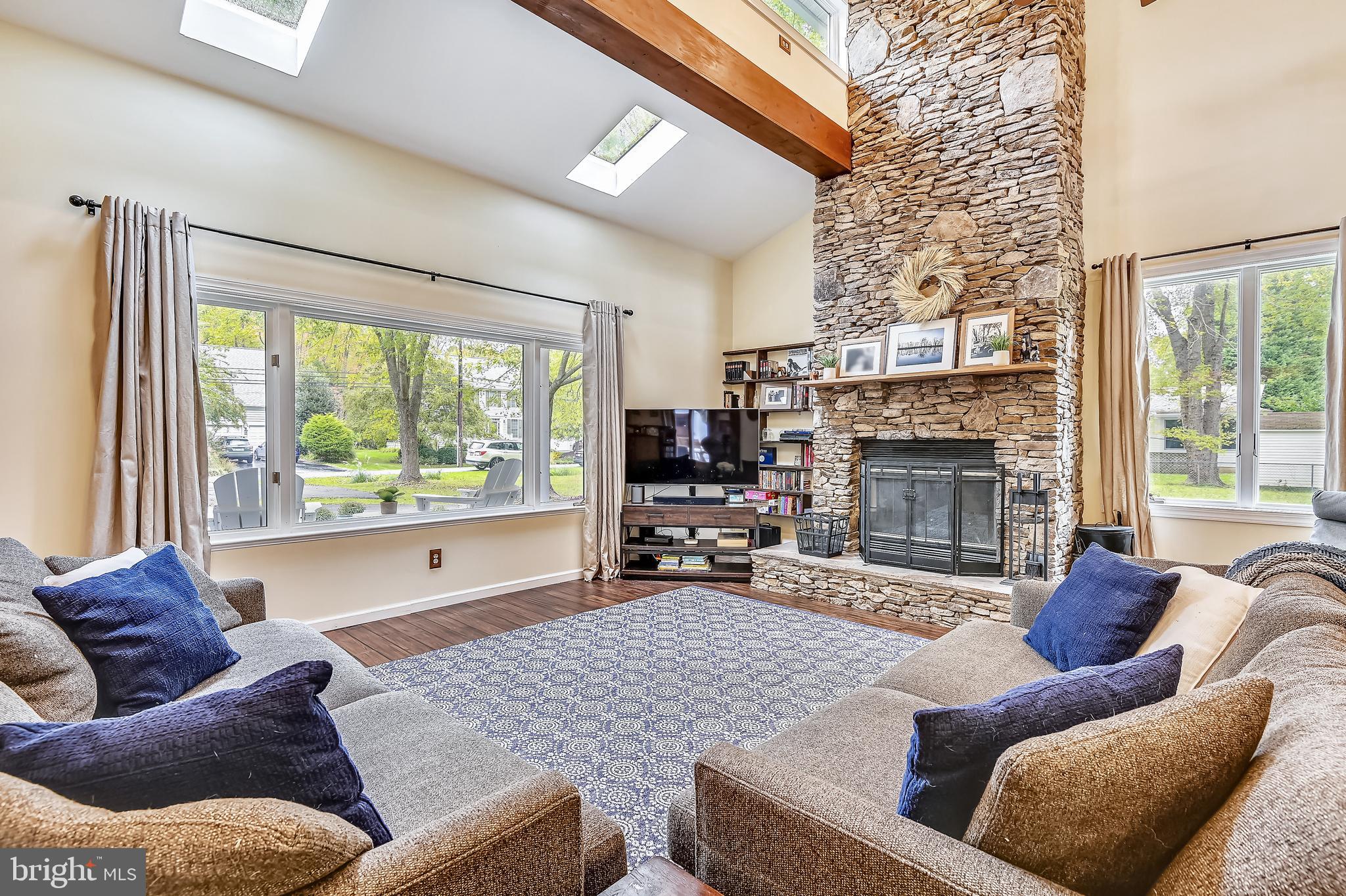 615 Burley Road Annapolis, MD 21409 - Photo 9 of 42 Two story great room with stacked stone fireplace