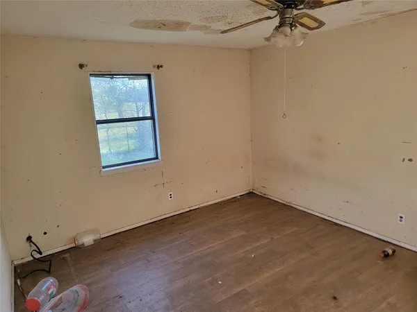 wooden floor and window in a room