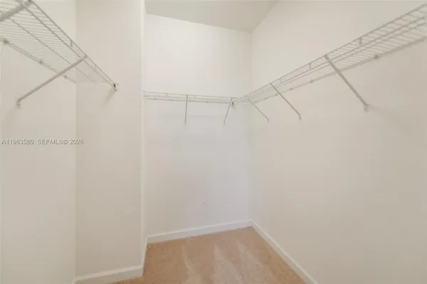 a view of a room with racks on the wall