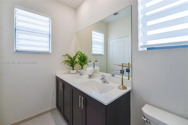 a bathroom with a sink and a toilet