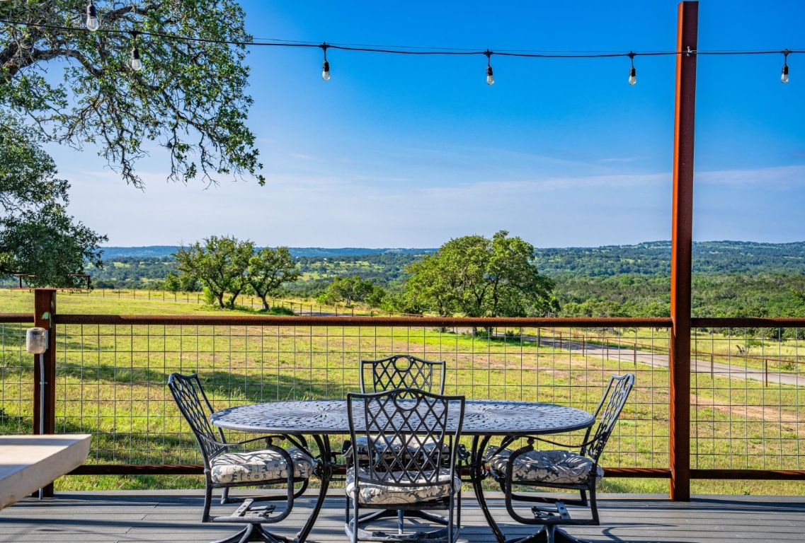 0 Gibson-Best Road Hye, TX 78635 - Photo 12 of 40 a view of a chairs and table on the deck