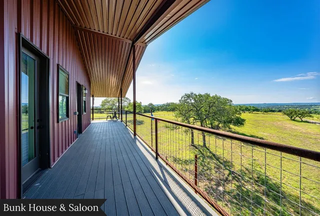 a view of a swimming pool and an outdoor seating