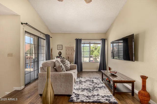 a living room with furniture and a window