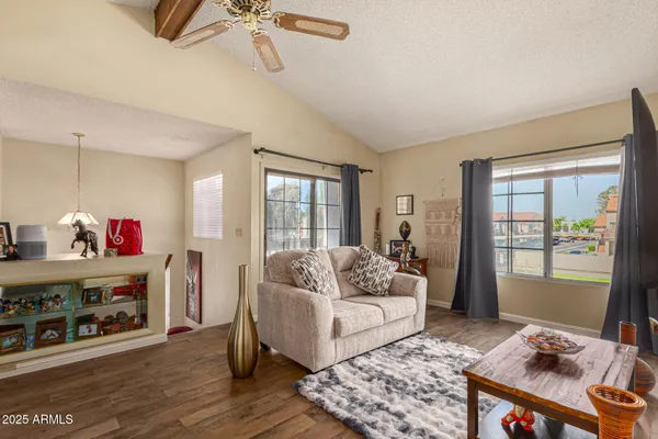 a living room with furniture and a couch