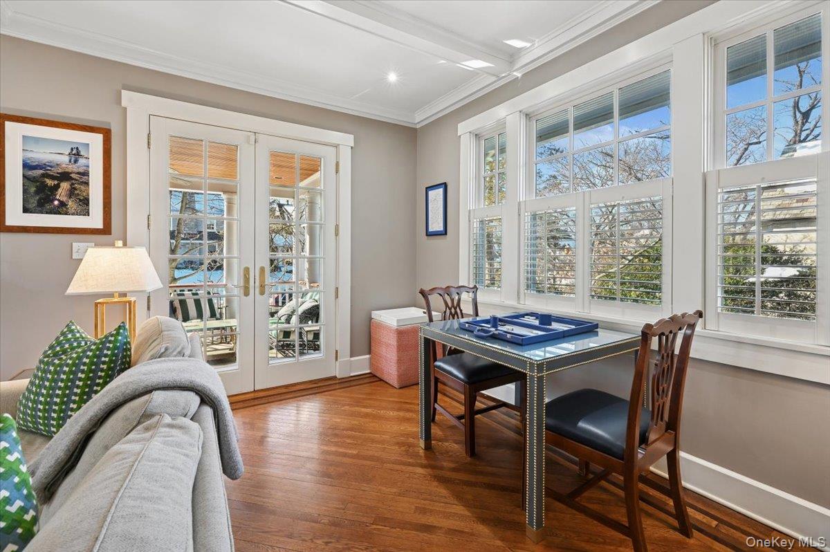 31 Emerson Road Larchmont, NY 10538 - Photo 6 of 39 This game table space is at the far end of the oversized living room. The french doors lead to the porch.