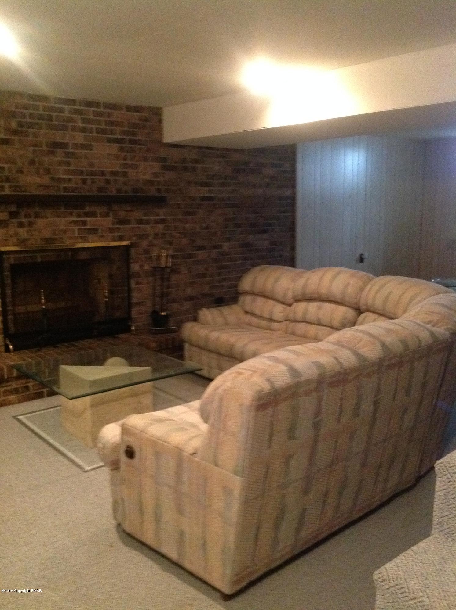 134 Faith Road Sugarloaf, PA 18249 - Photo 29 of 40 lower level fireplace