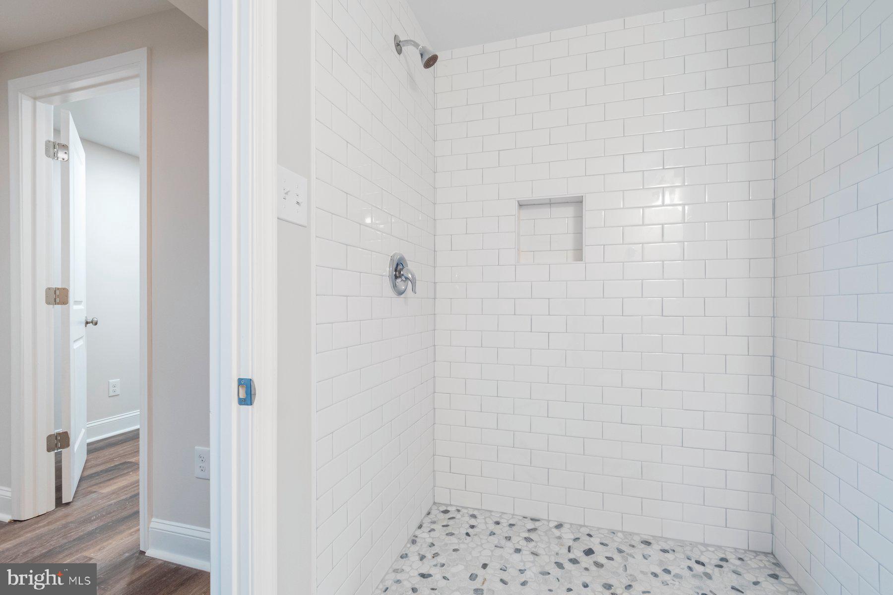 7324 Kirtley Road Baltimore, MD 21224 - Photo 23 of 27 a bathroom with a shower