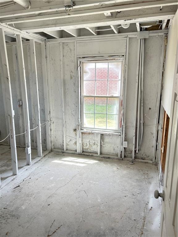 630 Mill Stone Bluff, Unit B Monroe, GA 30655 - Photo 5 of 14 a view of an empty room with a window