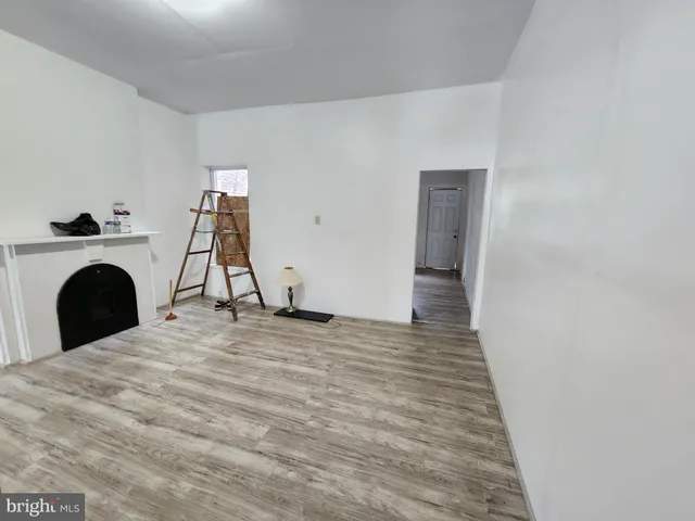 a view of a livingroom with a fireplace