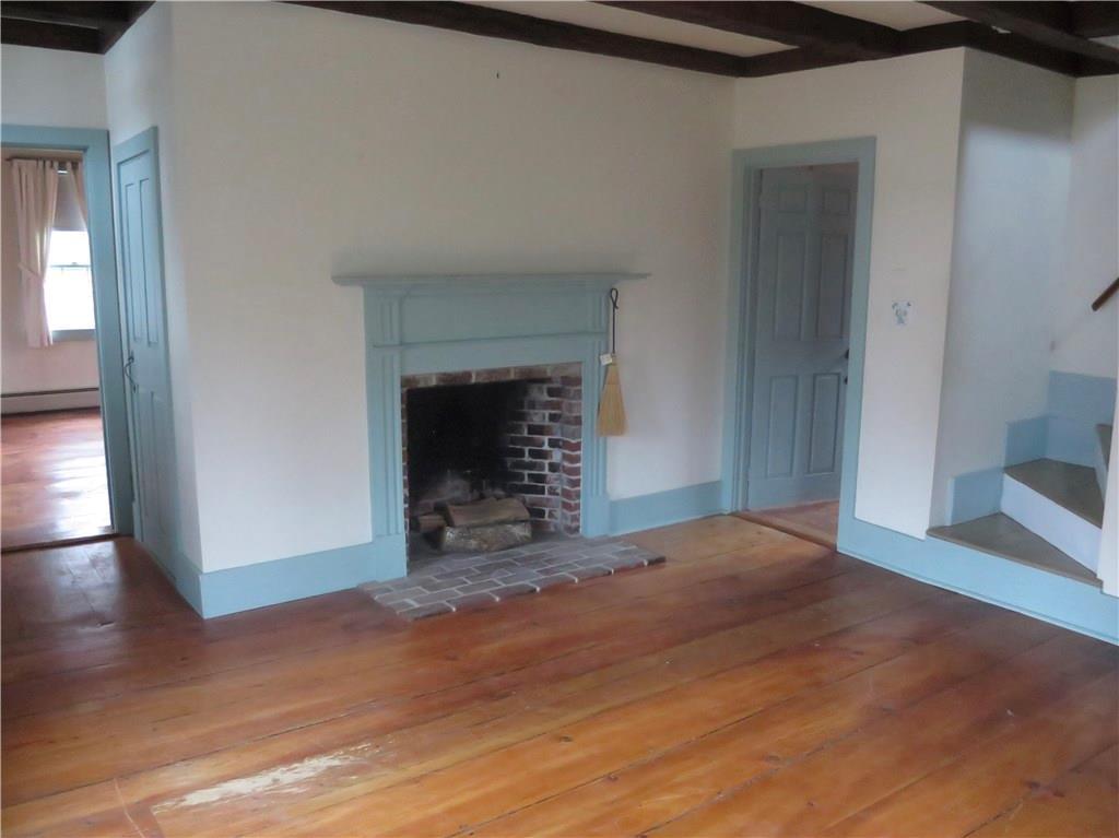 17 Storer Road Bremen, ME 04551 - Photo 11 of 18 Fireplace in the living room showing...