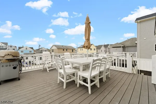 a view of a terrace with seating area