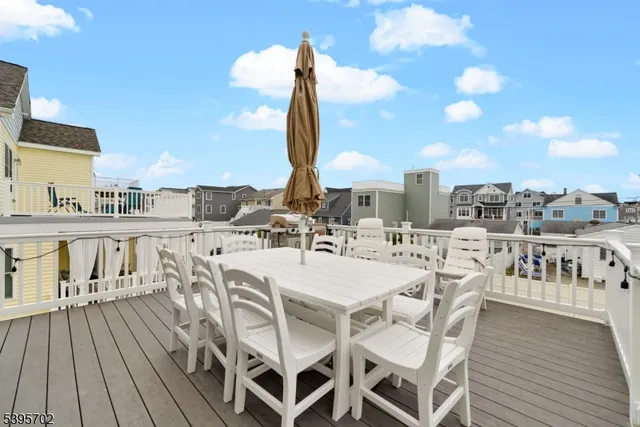 a view of a balcony with chairs