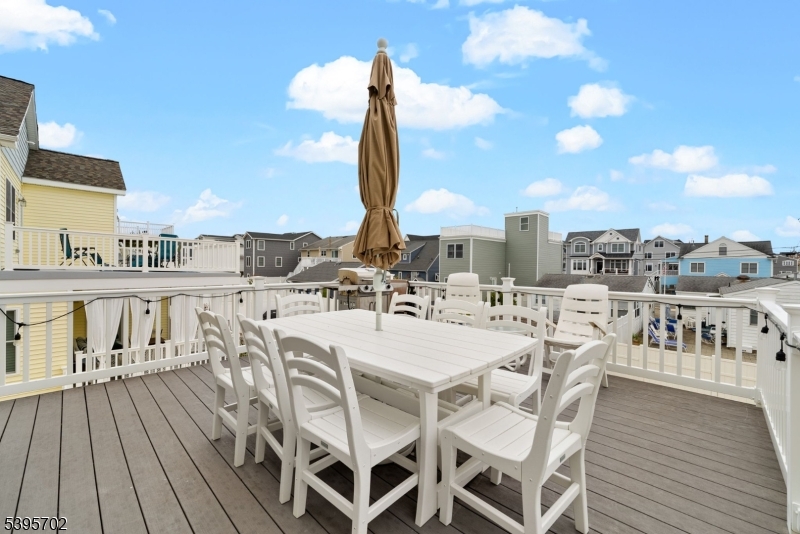15 7th Avenue Seaside Heights, NJ 08751 - Photo 12 of 27 a view of a balcony with chairs