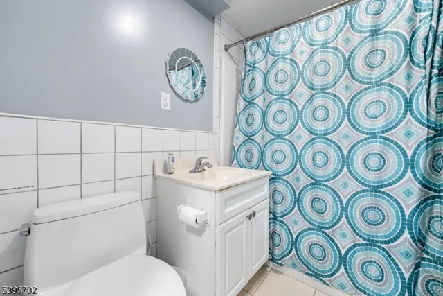 a bathroom with a toilet and a sink