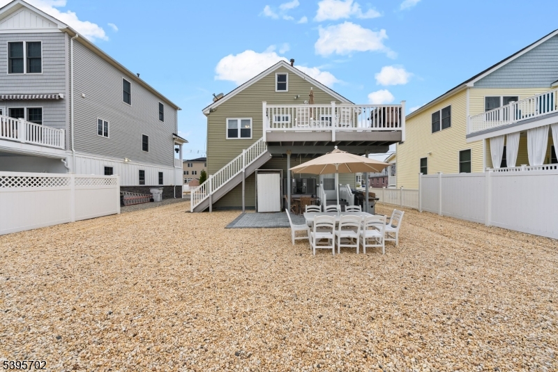 15 7th Avenue Seaside Heights, NJ 08751 - Photo 24 of 27 a dining room with furniture and a wooden floor