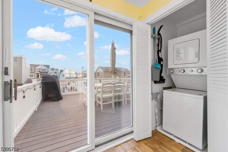 15 7th Avenue Seaside Heights, NJ 08751 - Photo 10 of 27 a view of a balcony with furniture and floor to ceiling window