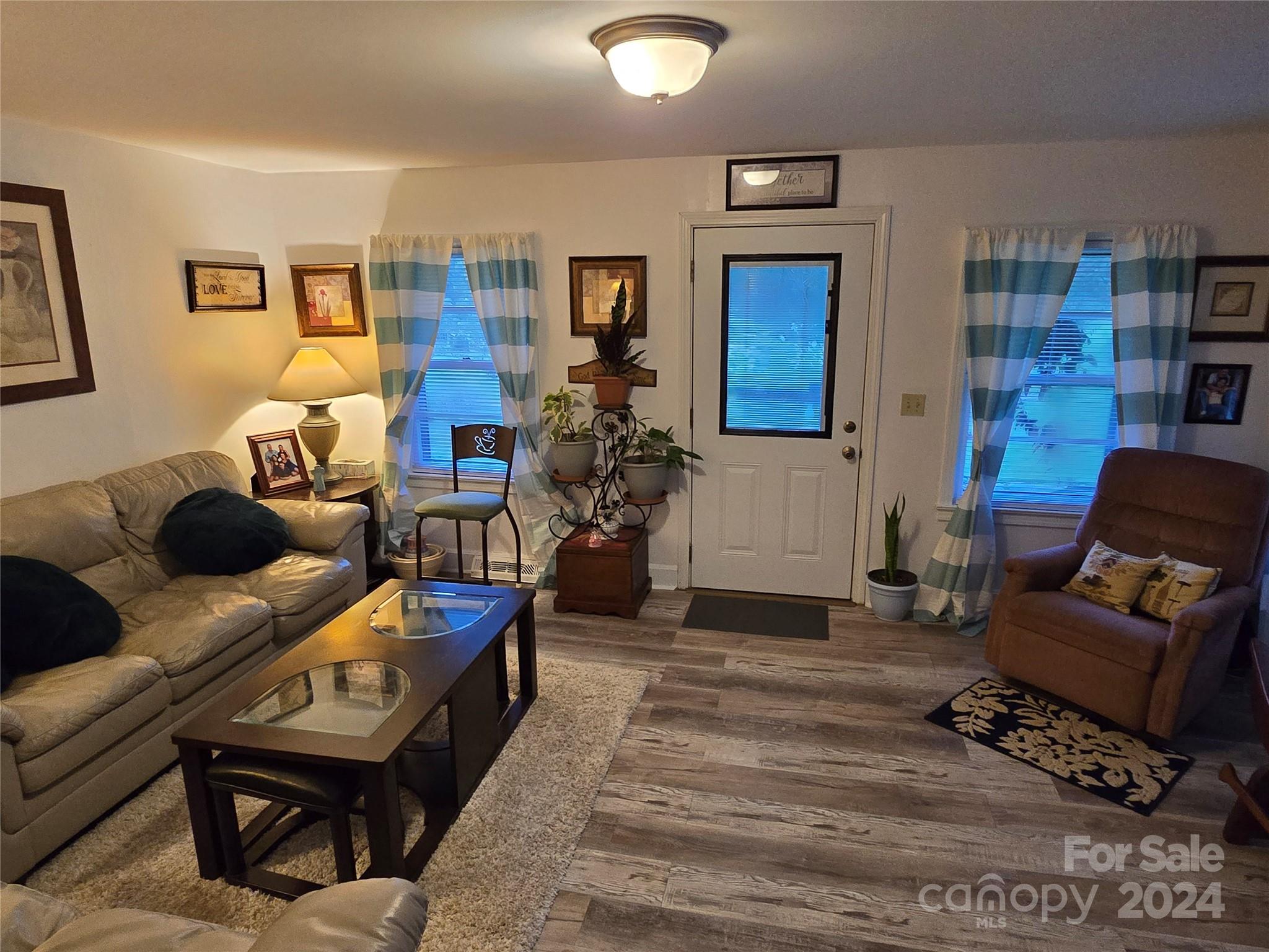 206 Fallen Oaks Lane Rutherfordton, NC 28139 - Photo 17 of 26 a living room with furniture and wooden floor