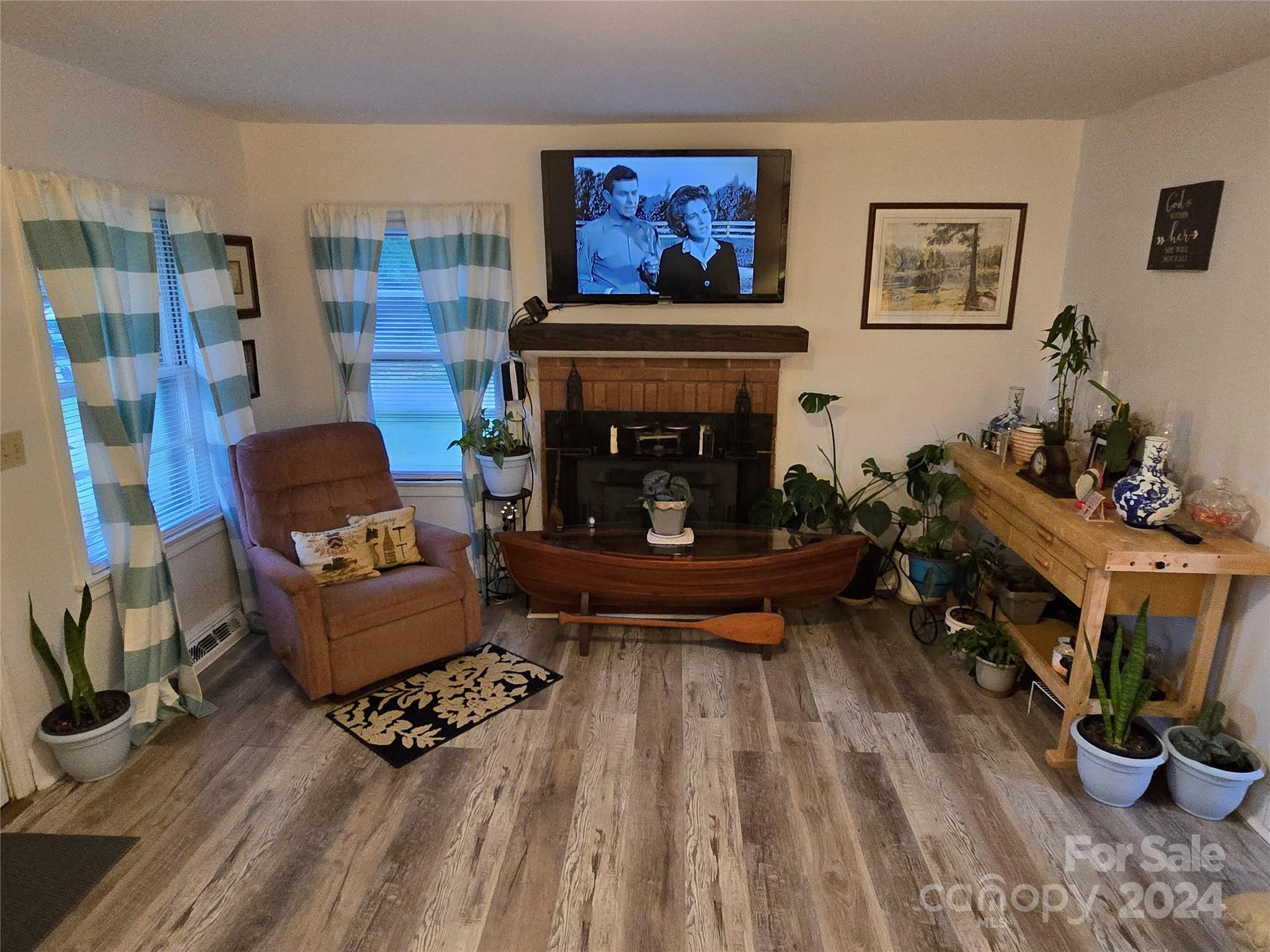 206 Fallen Oaks Lane Rutherfordton, NC 28139 - Photo 18 of 26 a living room with furniture and a fireplace