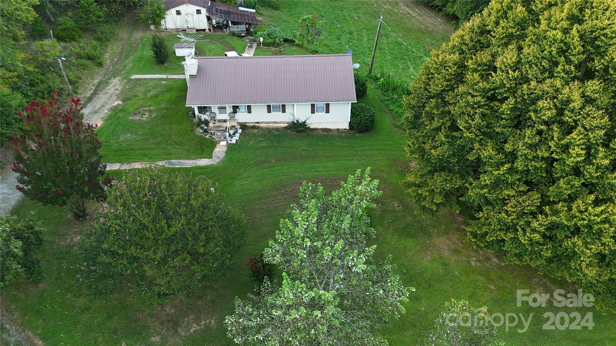 206 Fallen Oaks Lane Rutherfordton, NC 28139 - Photo 2 of 26 an aerial view of a house