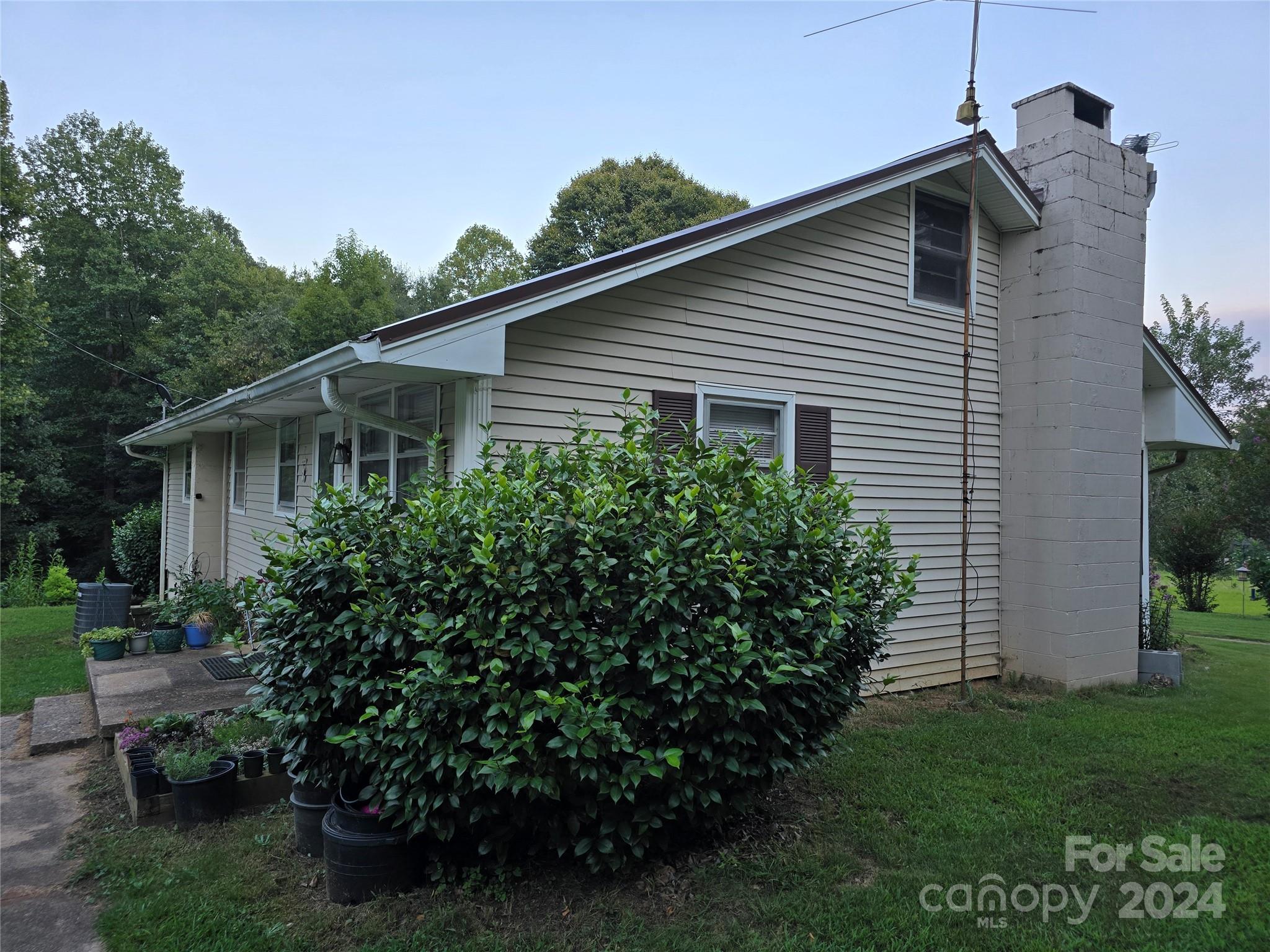 206 Fallen Oaks Lane Rutherfordton, NC 28139 - Photo 8 of 26 a view of a house with a yard