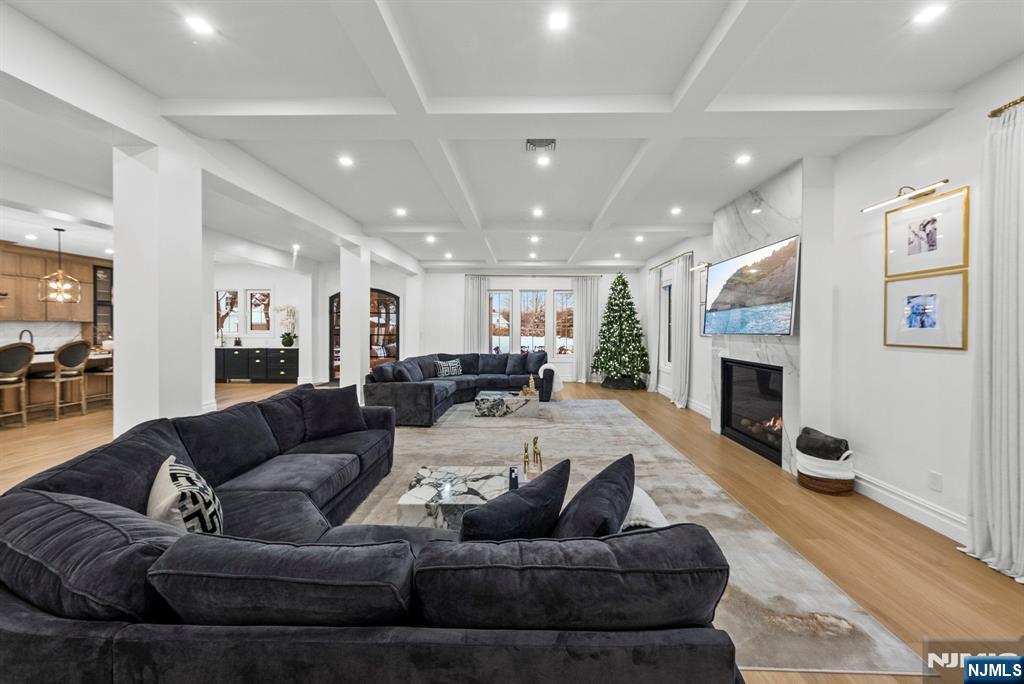 472 High Street Closter, NJ 07624 - Photo 16 of 38 a living room with furniture fireplace and a couch