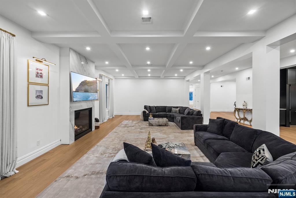 472 High Street Closter, NJ 07624 - Photo 18 of 38 a living room with furniture and a fireplace