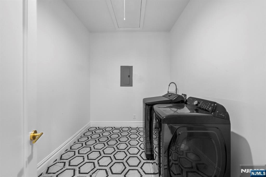472 High Street Closter, NJ 07624 - Photo 22 of 34 a utility room with dryer and washer