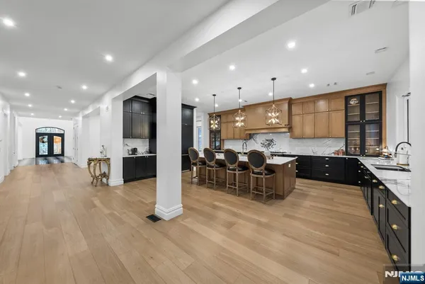 a living room with furniture gym equipment and a flat screen tv