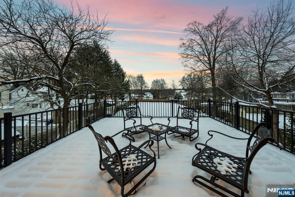472 High Street Closter, NJ 07624 - Photo 30 of 38 a view of a chairs and table in the back yard