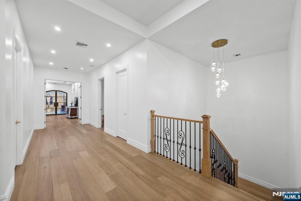 472 High Street Closter, NJ 07624 - Photo 3 of 34 a view of a hallway with wooden floor