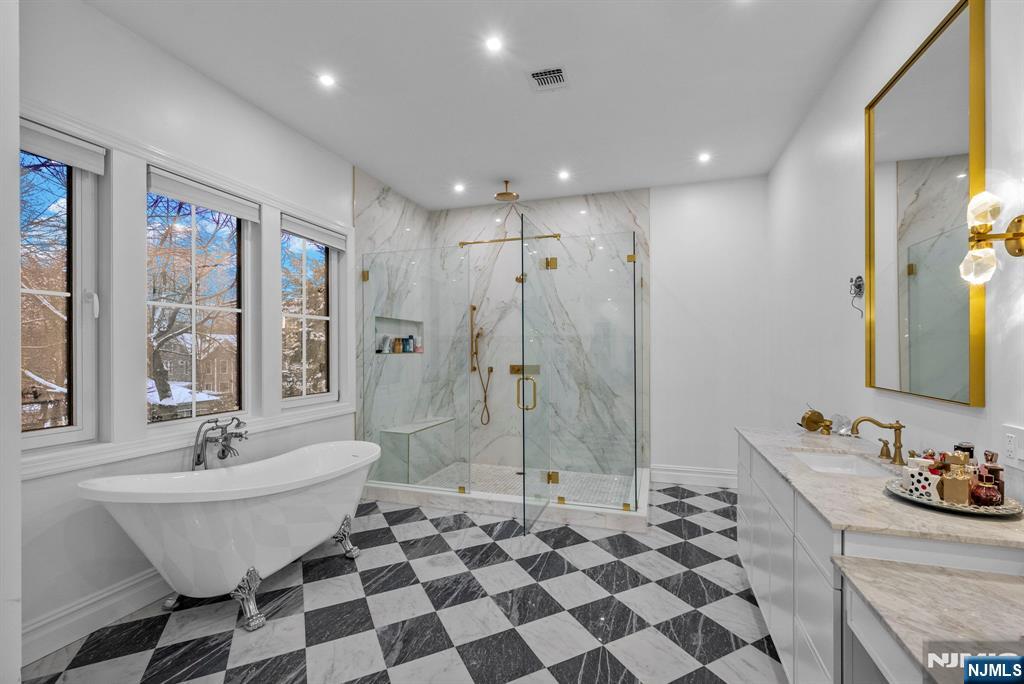 472 High Street Closter, NJ 07624 - Photo 35 of 38 a bathroom with a sink toilet and shower