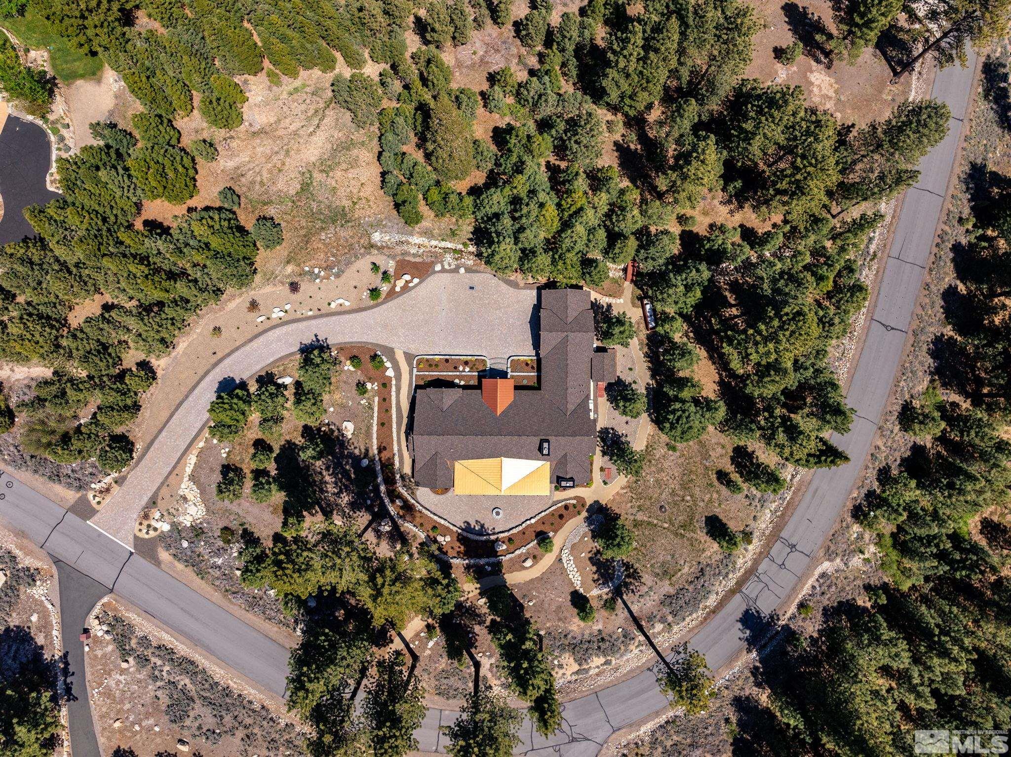 119 Five Creek Road Gardnerville, NV 89460 - Photo 39 of 40 an aerial view of a house with a yard and trees