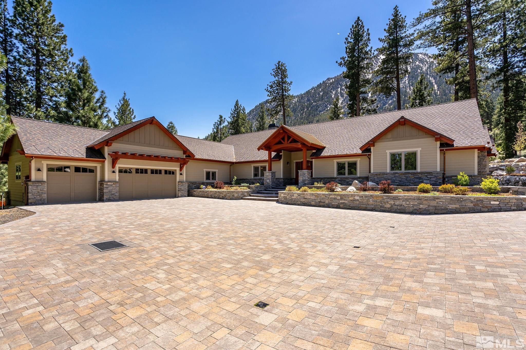 119 Five Creek Road Gardnerville, NV 89460 - Photo 5 of 40 a front view of a house with a yard and garage
