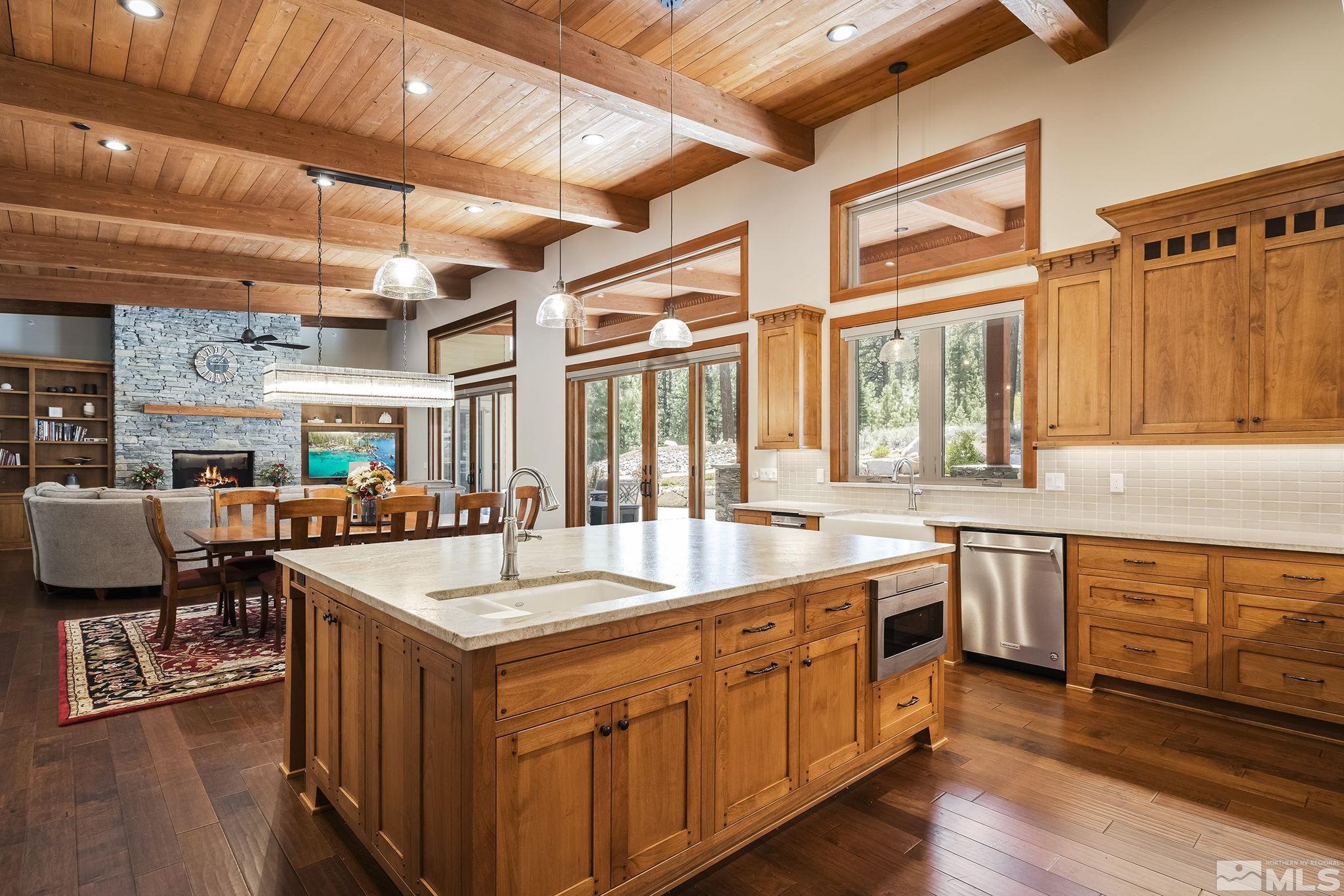 119 Five Creek Road Gardnerville, NV 89460 - Photo 8 of 40 a large kitchen with kitchen island a large island in it